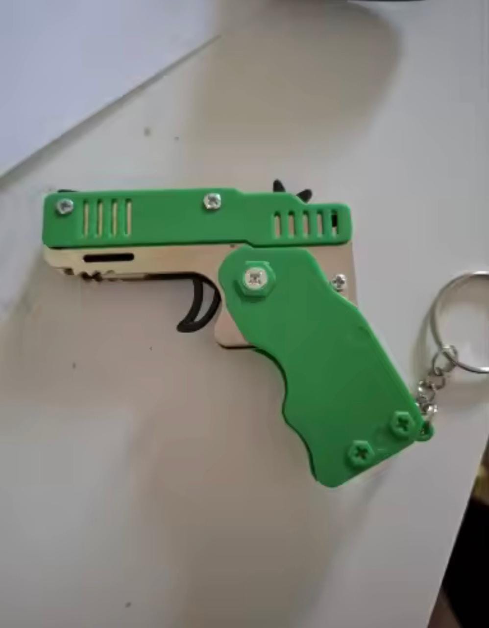 Customer photo review of Mini Pistola Lanza Ligas