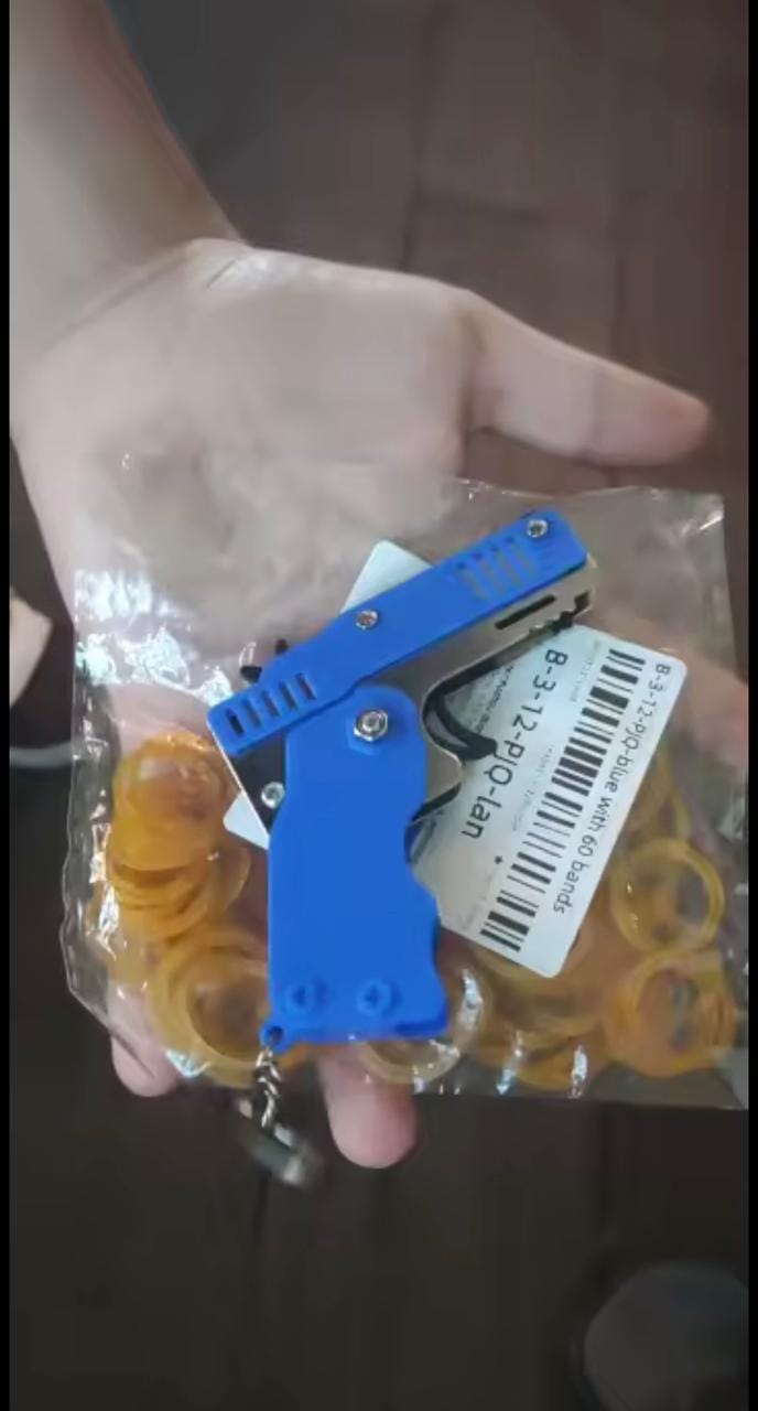 Customer photo review of Mini Pistola Lanza Ligas