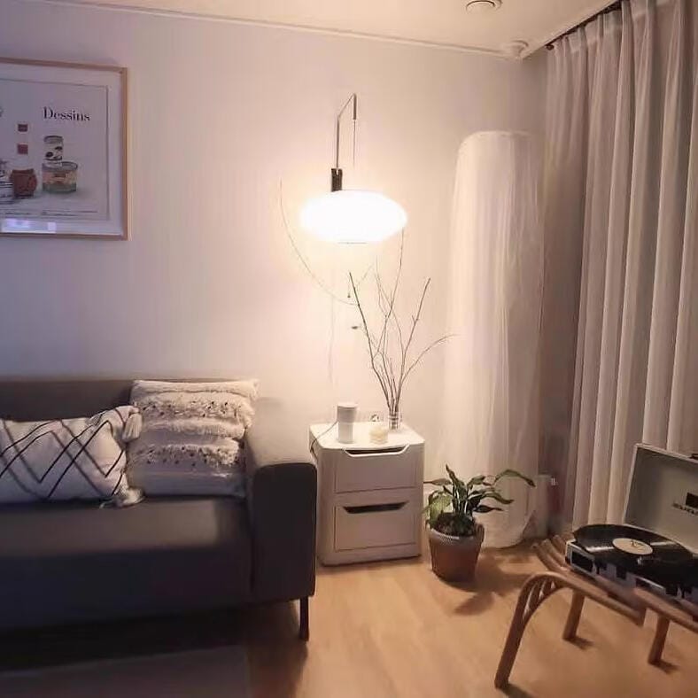 Customer photo review of Wall Sconce, White Polymer Shade, Walnut & Chrome, Swivel Plug-In E26
