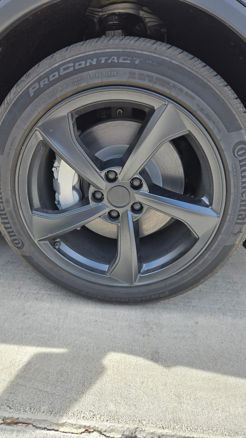 Customer photo review of Tesla Wheel Curb Rash Repair Kit for Model Y 19-inch Black Crossflow Rims with Color-matched Touch-Up Paint