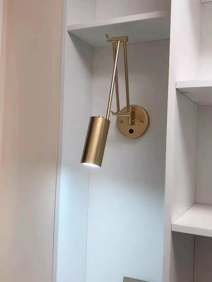 Customer photo review of Swing Arm Wall Sconce, Adjustable Iron Arm, Integrated LED, Gold