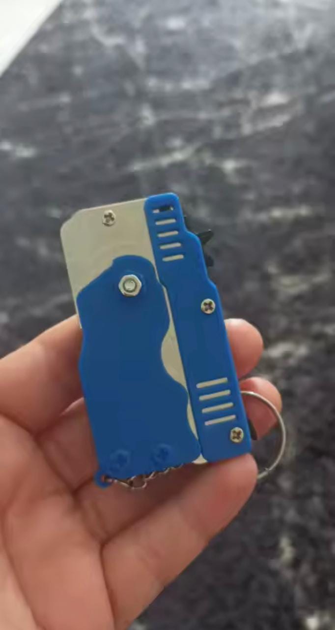 Customer photo review of Mini Pistola Lanza Ligas