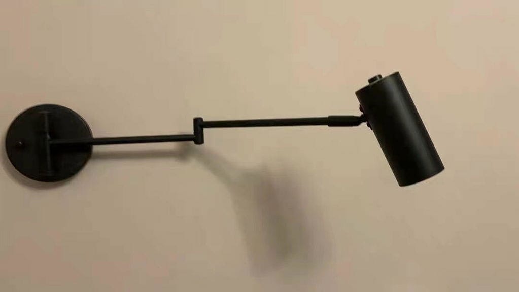 Customer photo review of Swing Arm Wall Sconce, Adjustable Iron Arm, Integrated LED, Gold