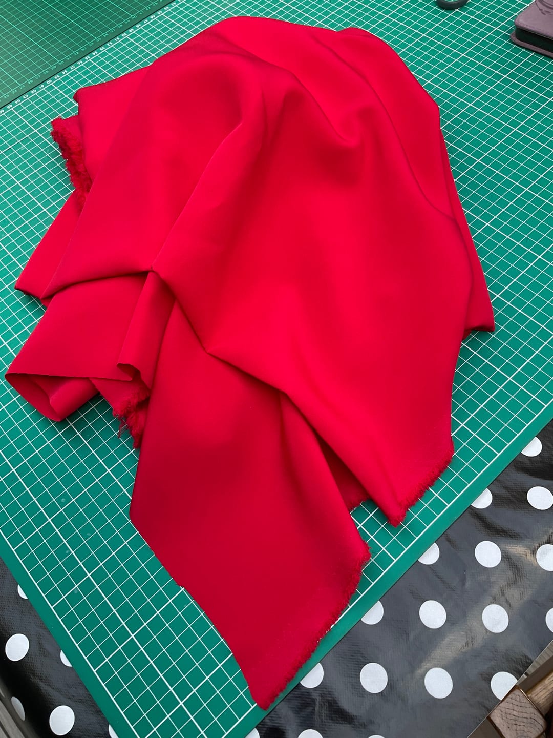Customer photo review of Crimson Red Stretch Polyester Fabric