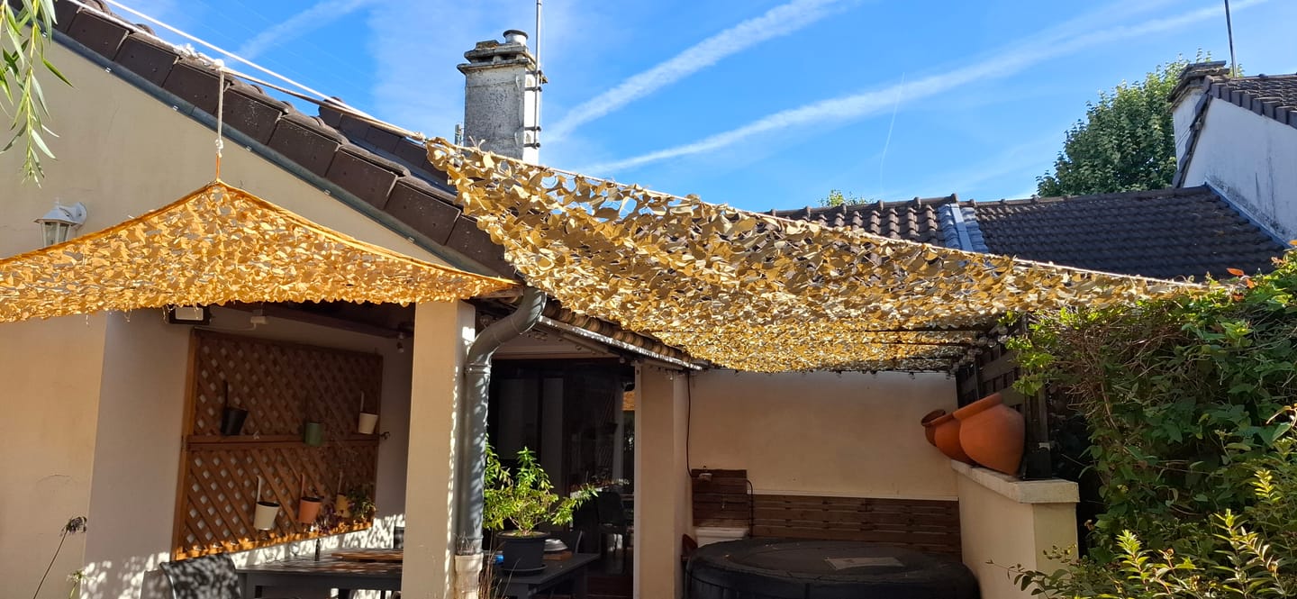 Customer photo review of Filet de camouflage triangulaire sable