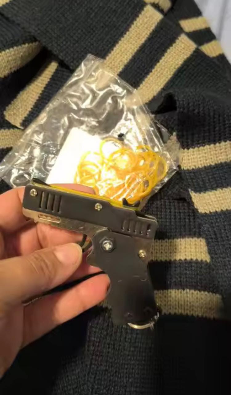 Customer photo review of Mini Pistola Lanza Ligas