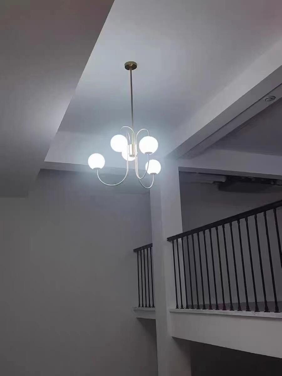 Customer photo review of Gooseneck Chandelier, Wrought Iron, White Glass Globes, E14