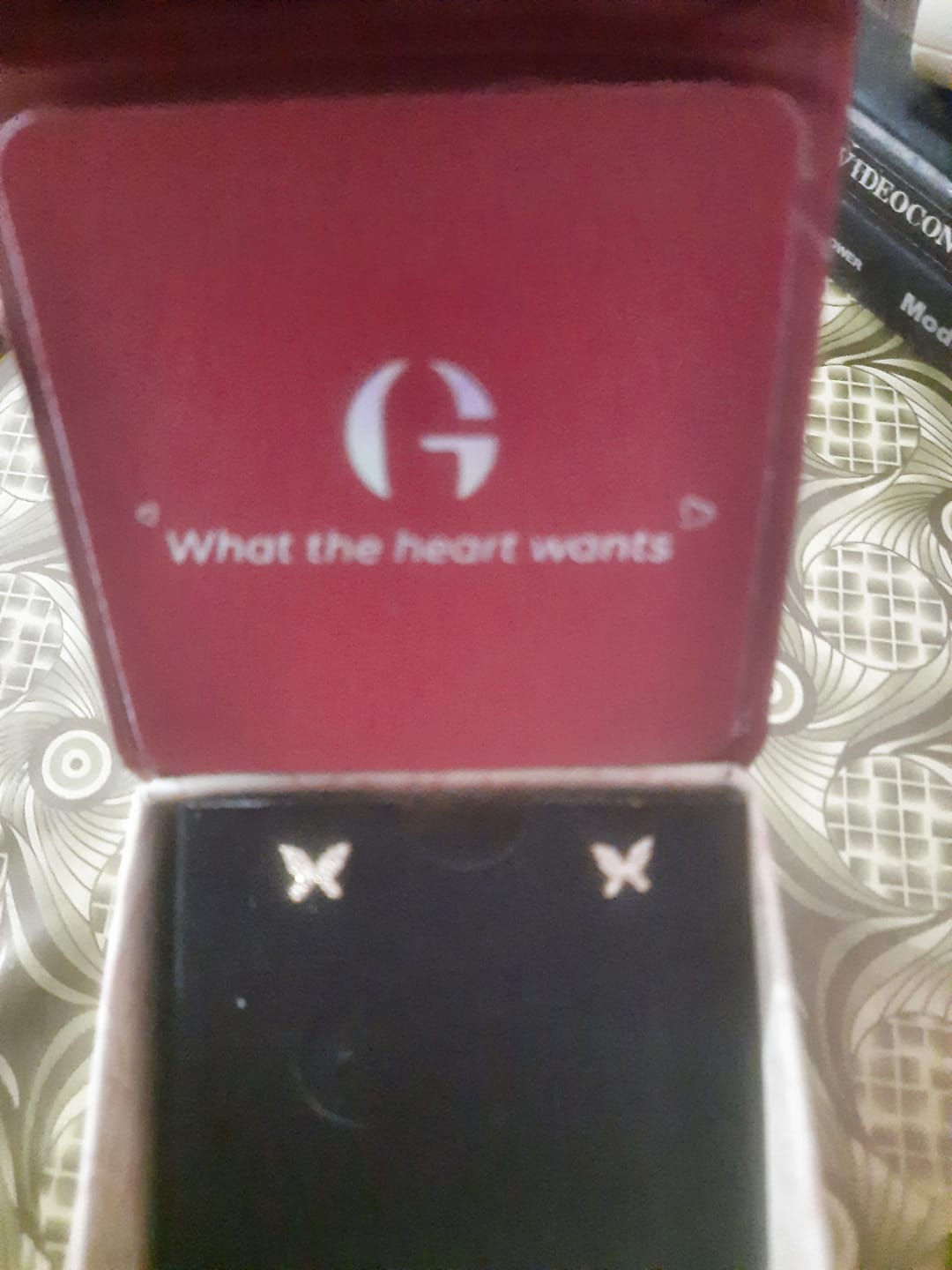 Customer photo review of Golden Butterfly Tiny Studded Affair Earrings