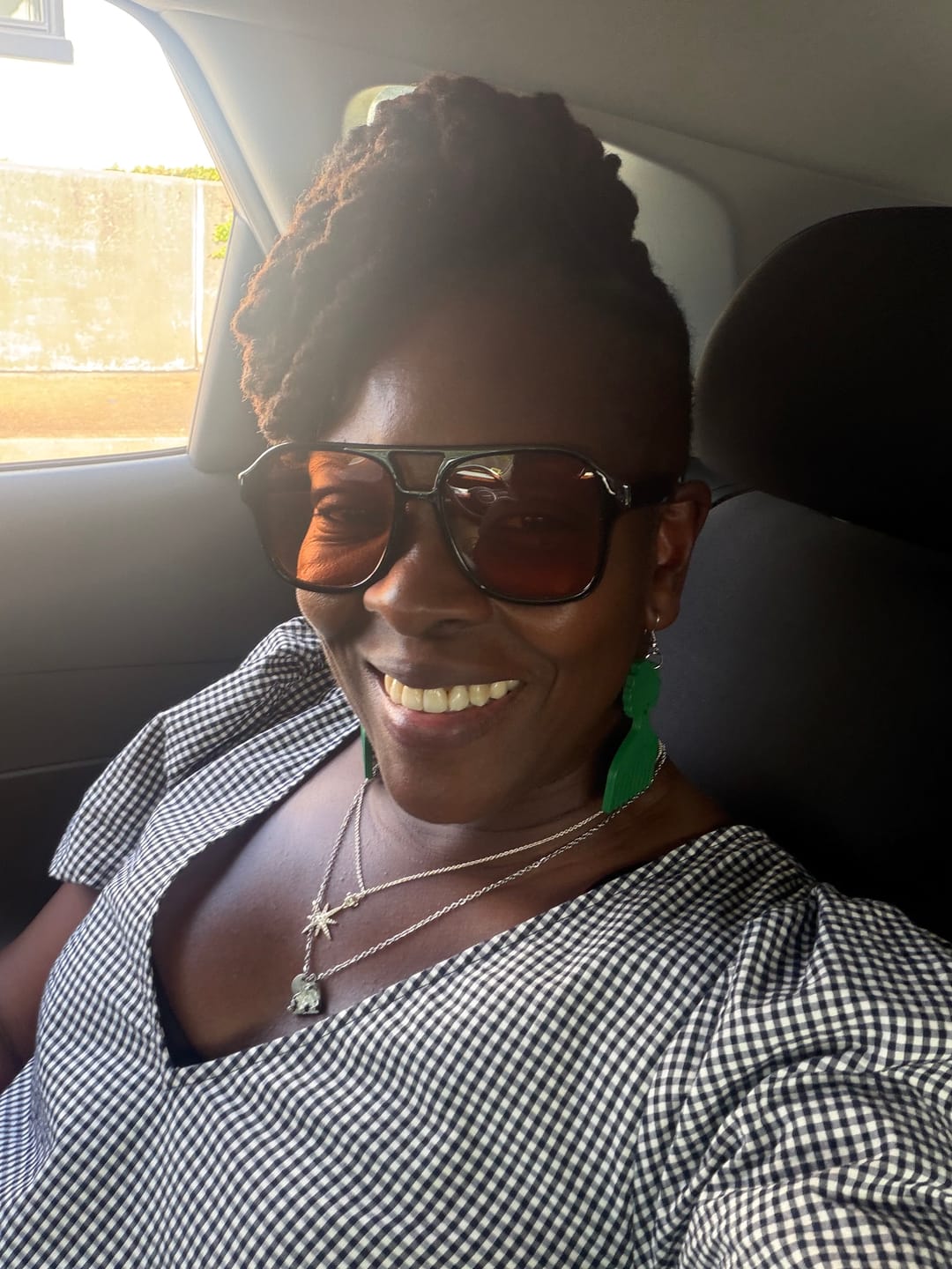Customer photo review of Afro comb and adinkra symbols Wooden Earring