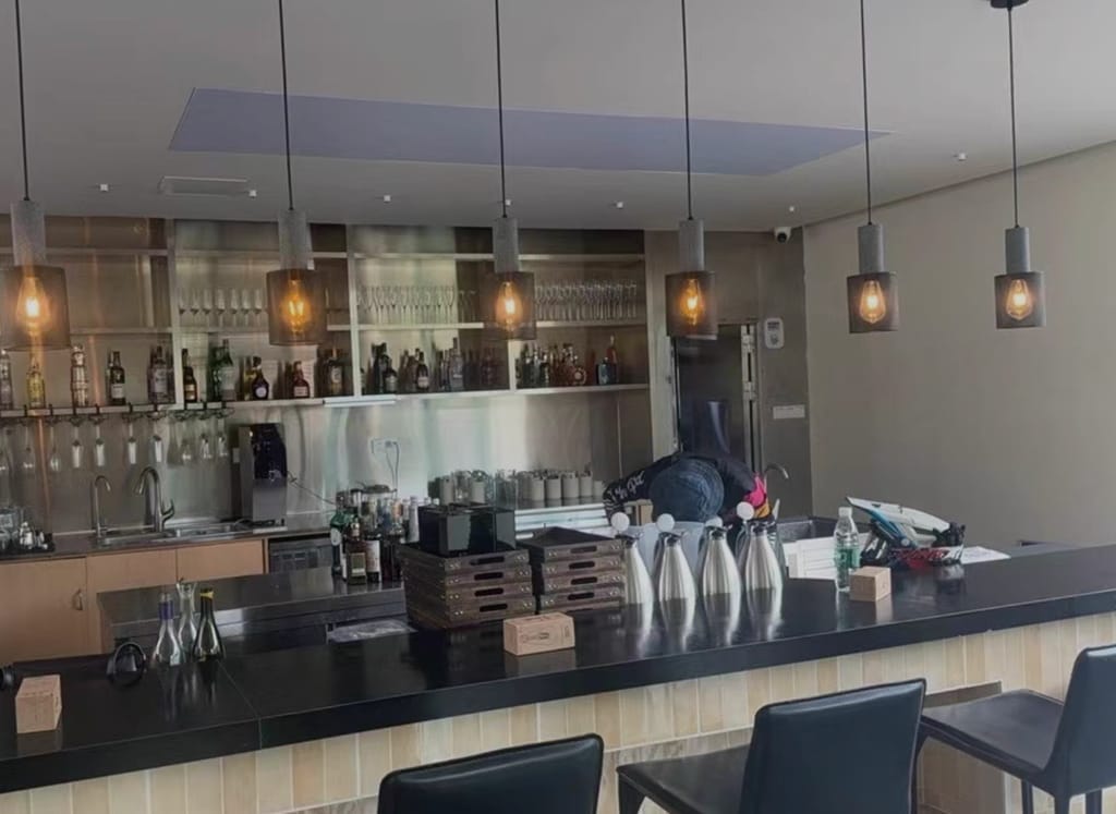 Customer photo review of Cement Mesh Pendant Light, Raw Cement Top, Black Wire Cage, E26/E27
