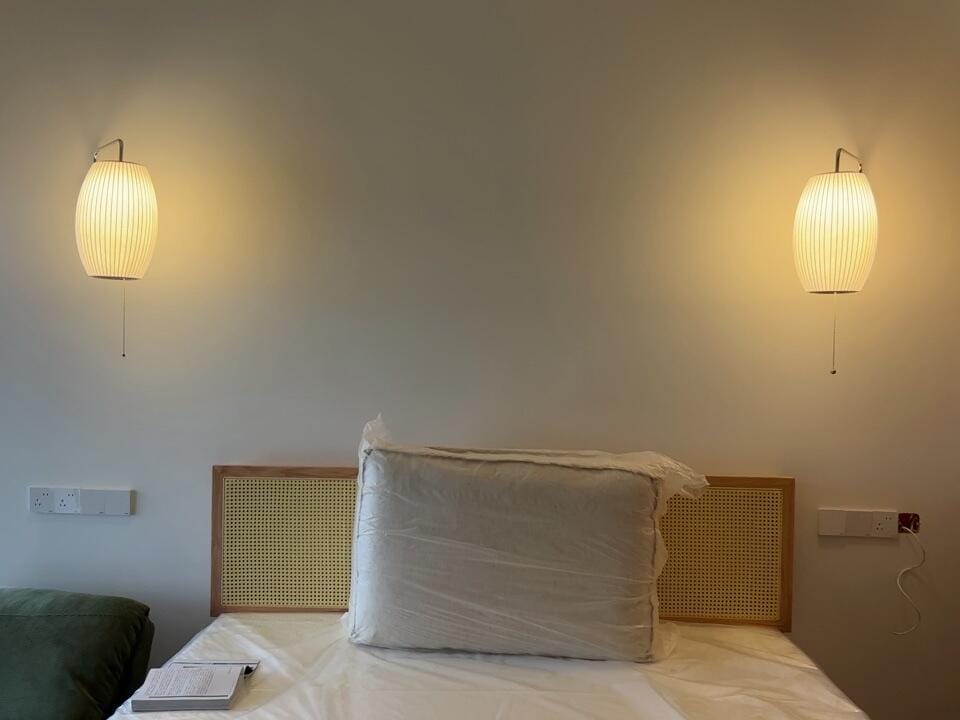 Customer photo review of Wall Sconce, White Polymer Shade, Walnut & Chrome, Swivel Plug-In E26