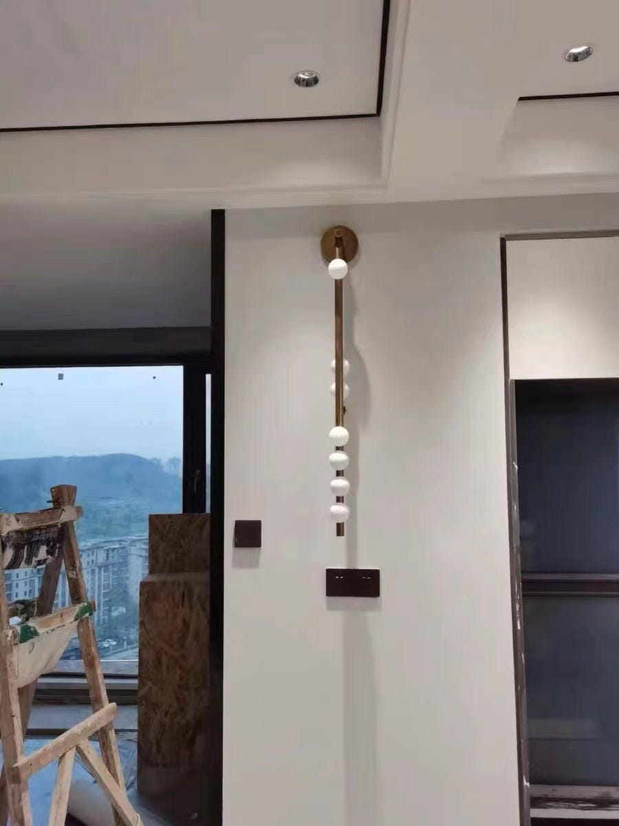Customer photo review of Glass Tube Wall Lamp, Blown Glass Globes, Brass Finish, G4 LED