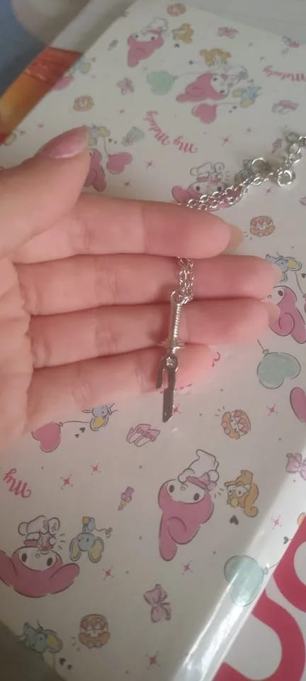 Customer photo review of Collar "Lanza Invertida"