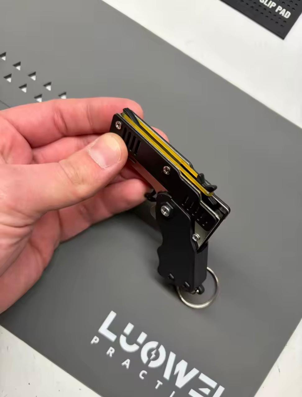 Customer photo review of Mini Pistola Lanza Ligas