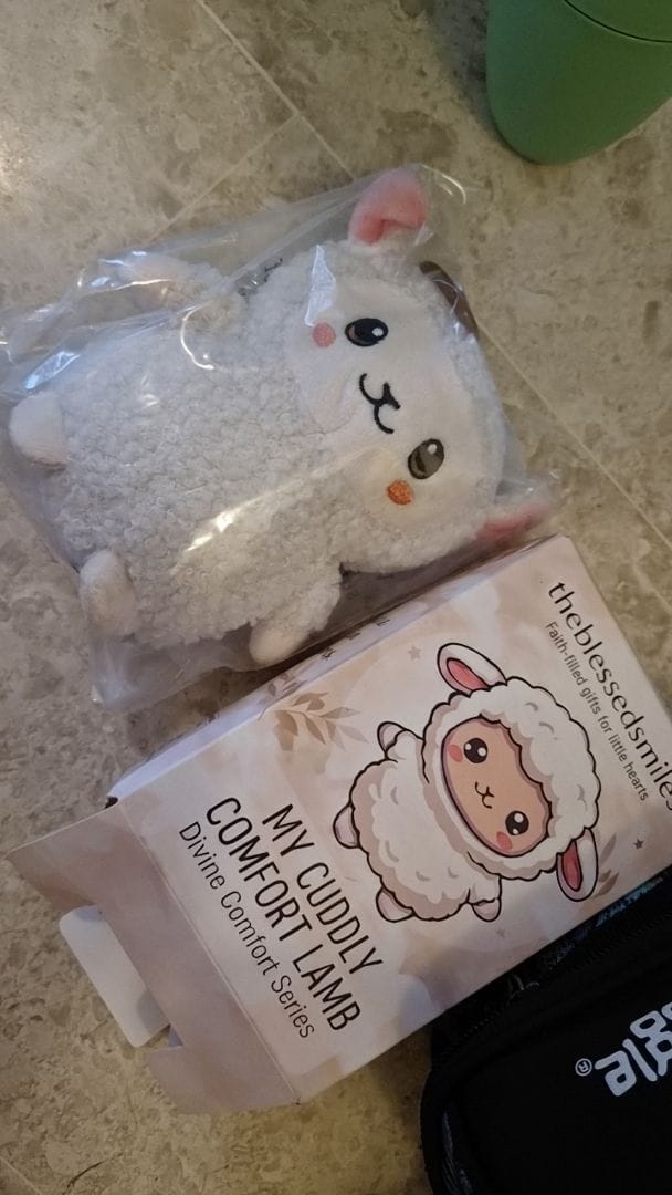 Customer photo review of Mini Jesus Plush Bag Charm