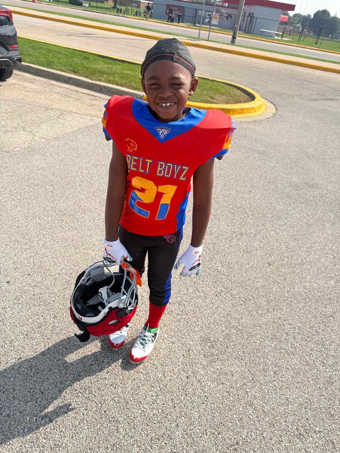 Customer photo review of The Officially Licensed Joker Youth Football Cleats - Velocity 2.0 by Phenom Elite