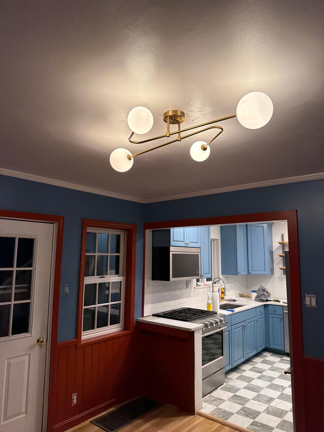 Customer photo review of 4-Light Frosted Glass Globe Linear Sputnik Semi Flush Mount