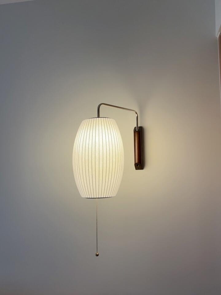 Customer photo review of Wall Sconce, White Polymer Shade, Walnut & Chrome, Swivel Plug-In E26