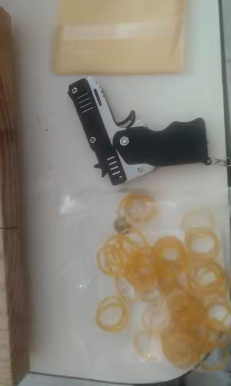 Customer photo review of Mini Pistola Lanza Ligas