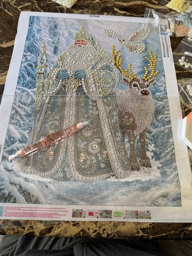 Customer's Personalized 3D Pearl Art DIY Kit featuring a santa and reindeer canvas with a setting tool.
