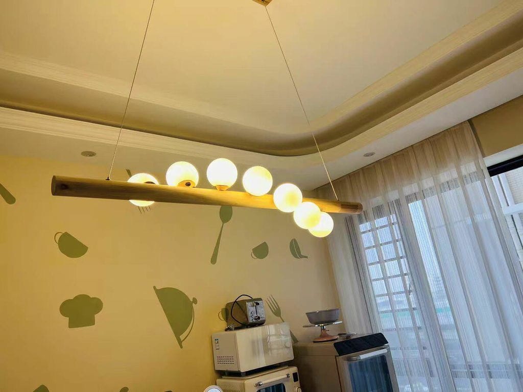 Customer photo review of Linear Wood Pendant Light, Walnut Bar, Opal Glass Globes, G9