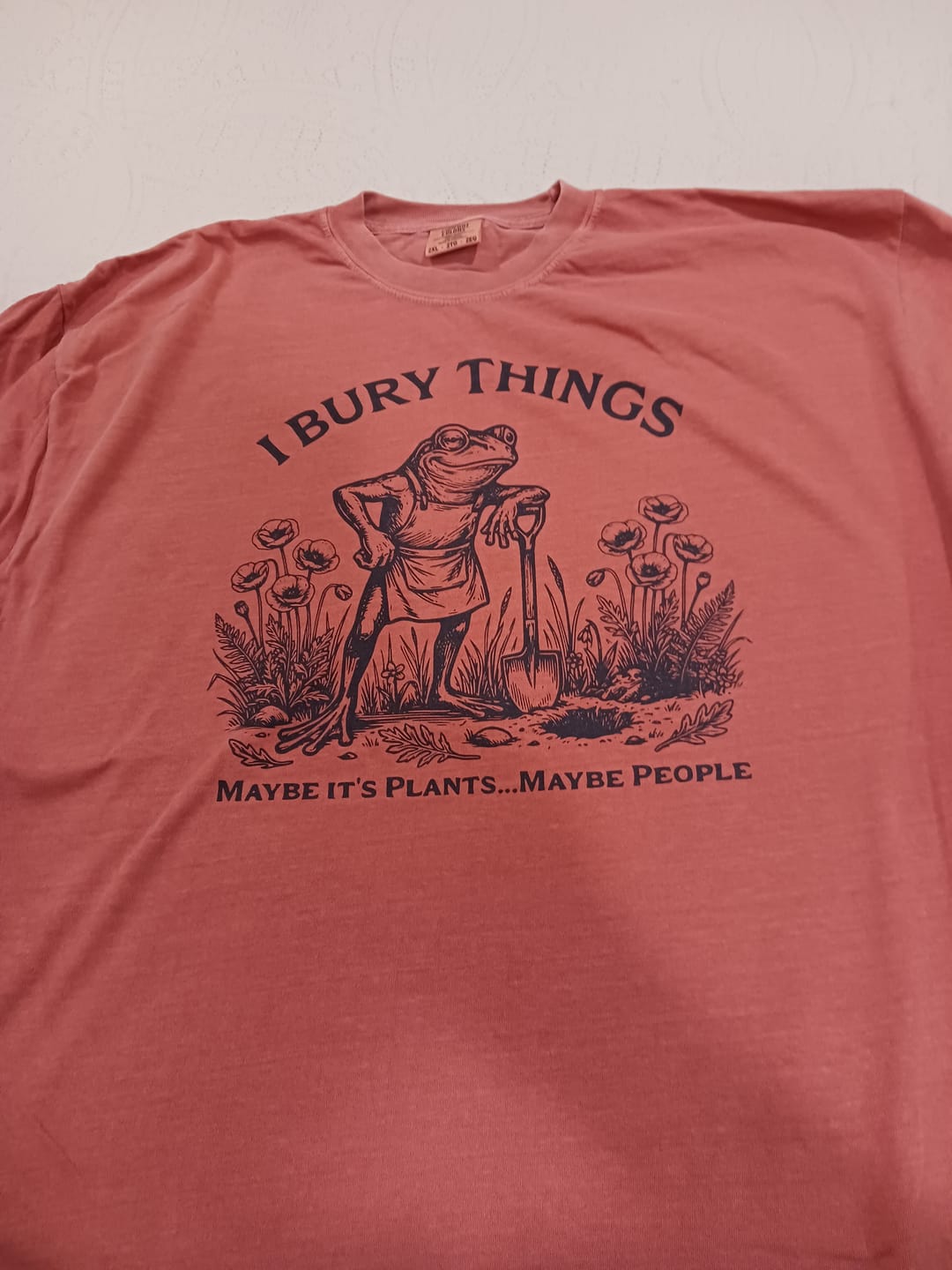 Customer photo review of I Bury Things Frog T-Shirt