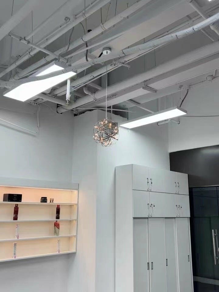 Customer photo review of Spark Ball Pendant Light, Stainless Steel Sphere, Warm White LED