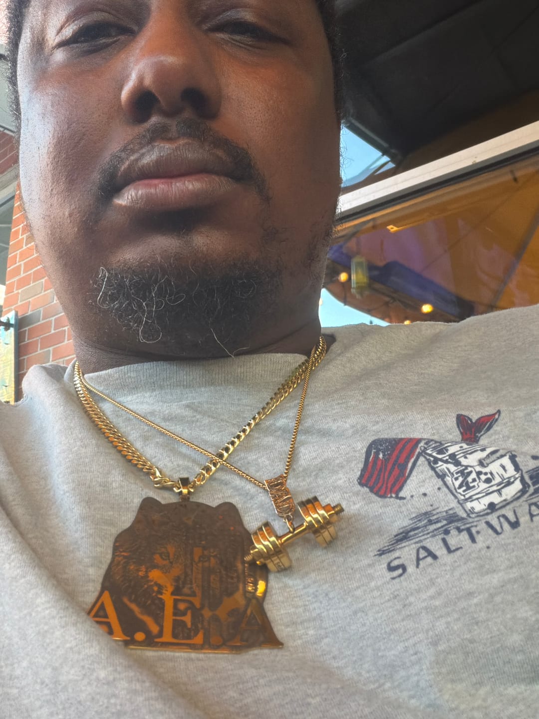 Customer photo review of Custom Photo Engraved Pendant Necklace