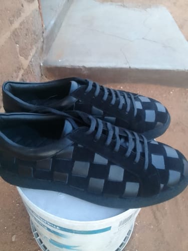 Customer's 244 Hand Weaved Lufiano Lace Up shoes in black, showing the detailed woven leather design on a bucket.