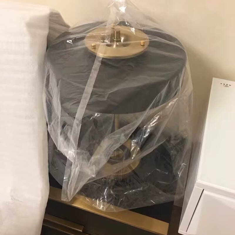 Customer photo review of Revolve Table Lamp, Spun Metal Shade, Opal Diffuser, Iron Base, G9