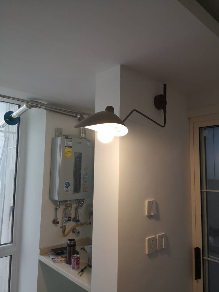 Customer photo review of Wall Sconce, Spider Long-Arm, Rotating Shade, Metal and Brass, E26 / E27