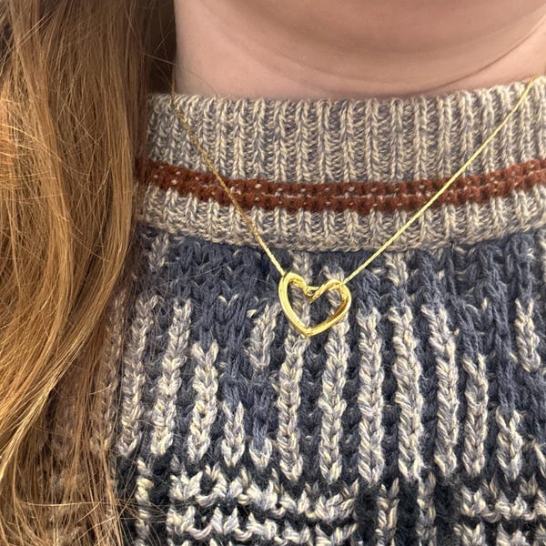 Customer photo review of Twisted Heart Necklace