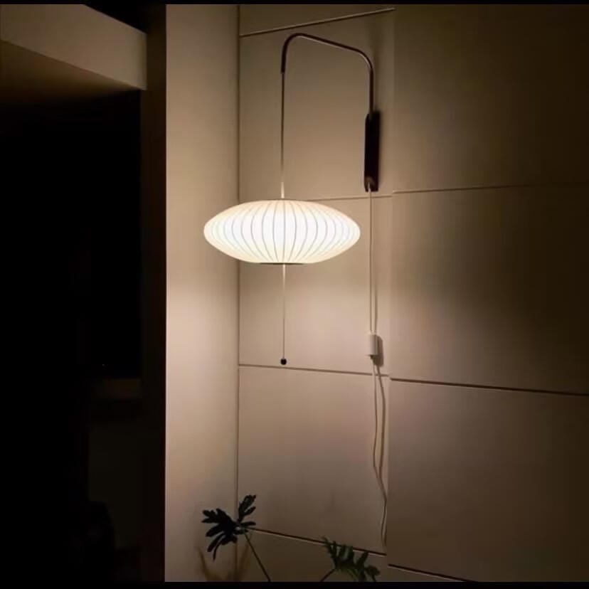 Customer photo review of Wall Sconce, White Polymer Shade, Walnut & Chrome, Swivel Plug-In E26