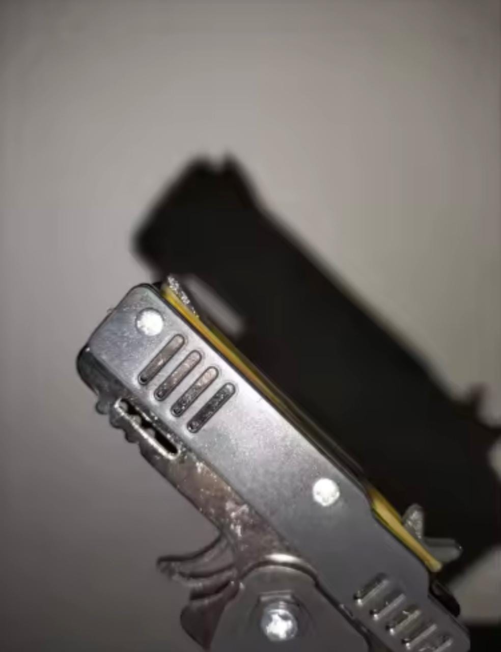 Customer photo review of Mini Pistola Lanza Ligas