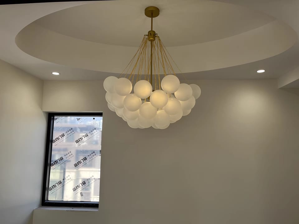 Customer photo review of Bubble Chandelier, Hand-Frosted Glass Globes, Gold or Black, E27