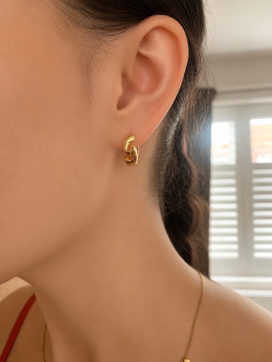 Customer photo review of Gold Chunky Wave Huggie Hoop Earrings
