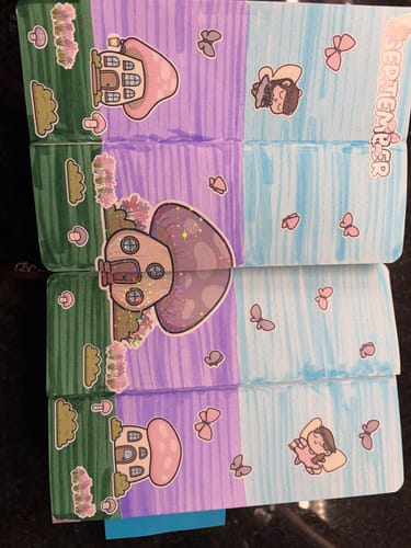 Reviewer's journal layout using Fairy Garden sticker sheets with mushroom houses, butterflies, and fairy characters.