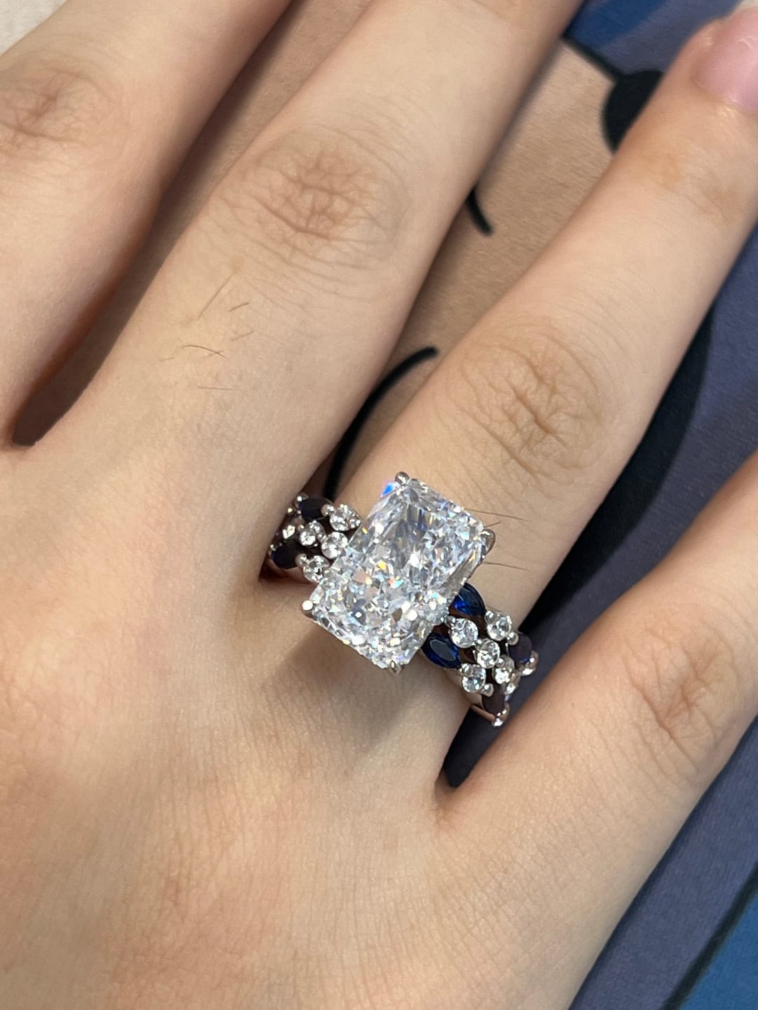 Customer photo review of S925 Elegant 5.0Ct Radiant Cut Hidden Halo Stckable Enhancer Ring Sets in Sterling Silver