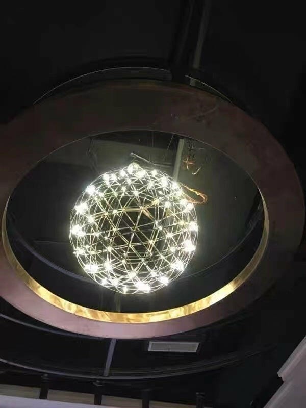 Customer photo review of Spark Ball Pendant Light, Stainless Steel Sphere, Warm White LED