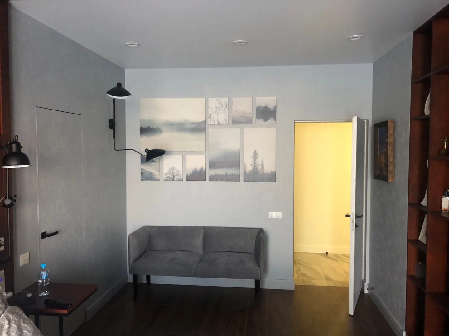 Customer photo review of Wall Sconce, Spider Long-Arm, Rotating Shade, Metal and Brass, E26 / E27