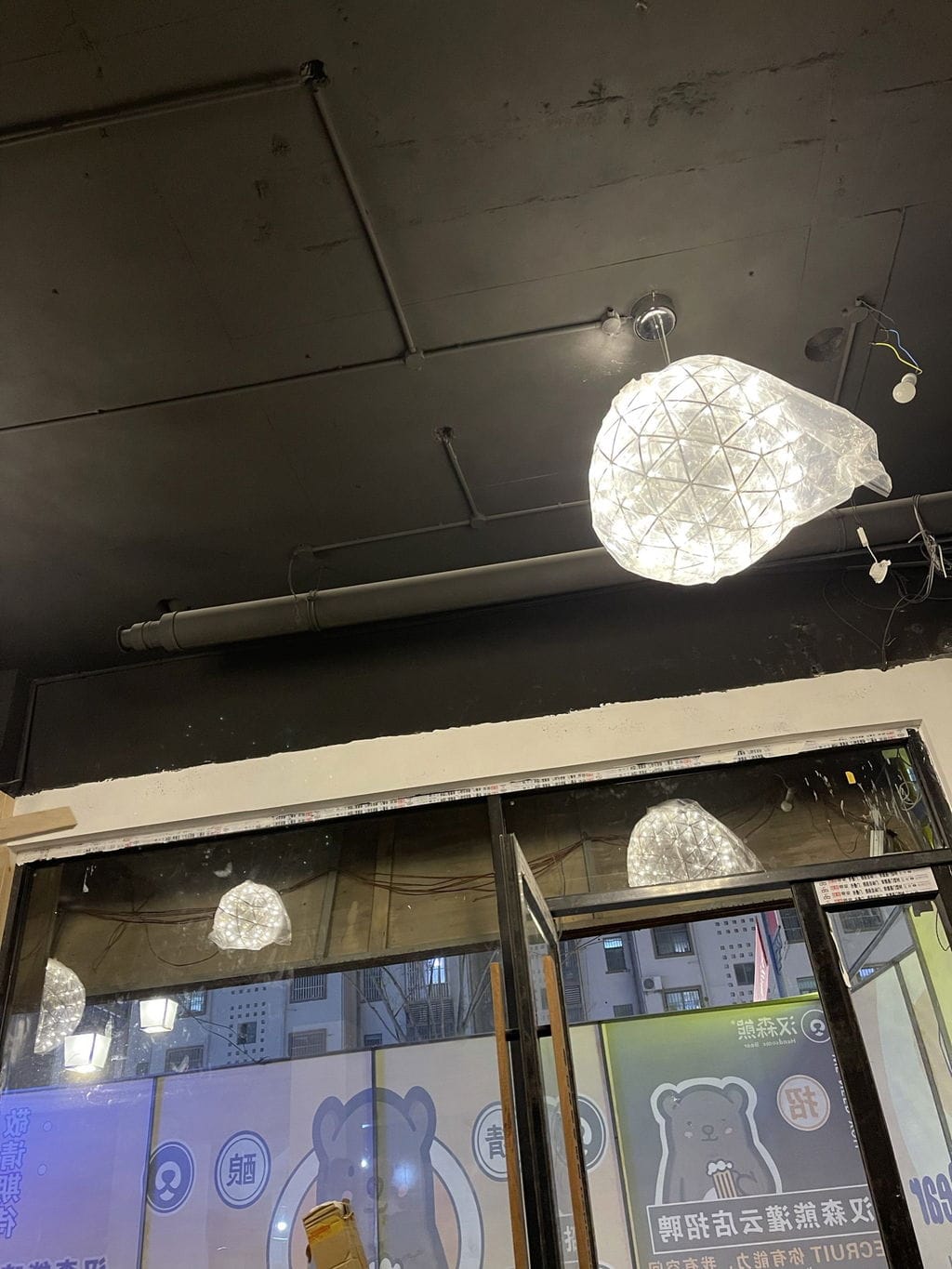 Customer photo review of Spark Ball Pendant Light, Stainless Steel Sphere, Warm White LED