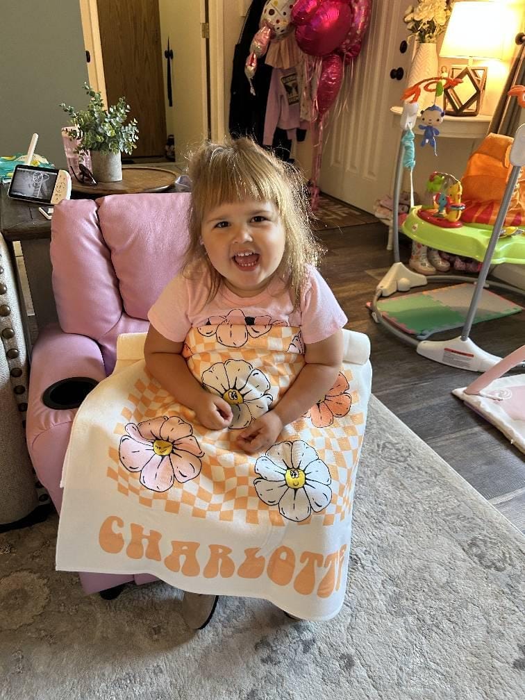 Customer photo review of Retro Floral Personalized Beach Towel: Custom Name Vacation Gift