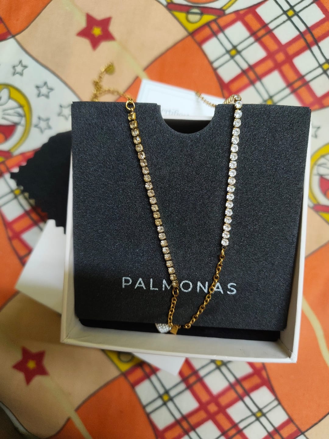 Customer photo review of Gleaming Mini Heart Necklace