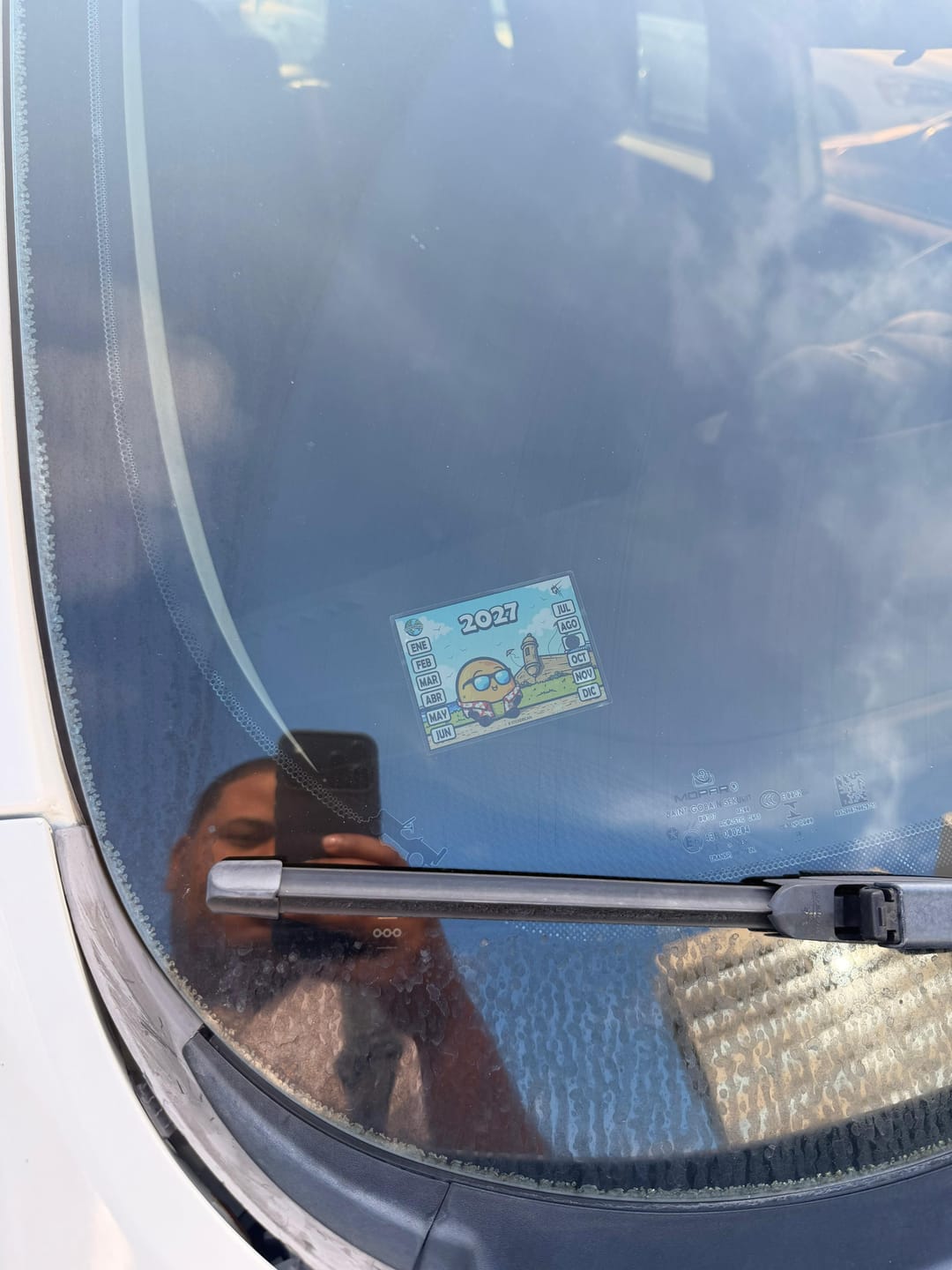 Customer photo review of Queni en el Viejo San Juan - Marbete Sticker
