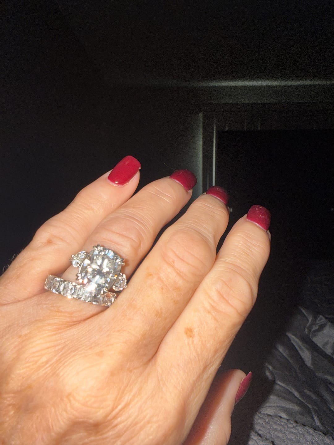 Customer photo review of Moissanite 6.0Ct Cushion Cut Three Stone Engagement Ring In Sterling Silver