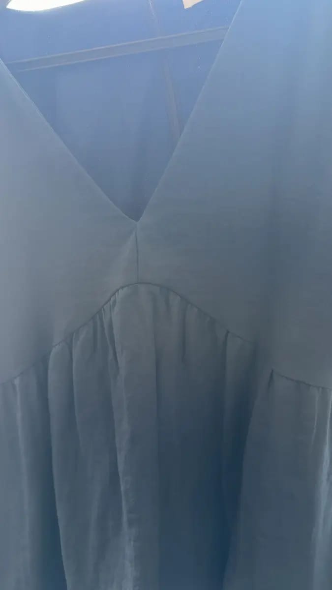 Customer photo review of V-Neck Short Sleeve Flowy Babydoll Blouse