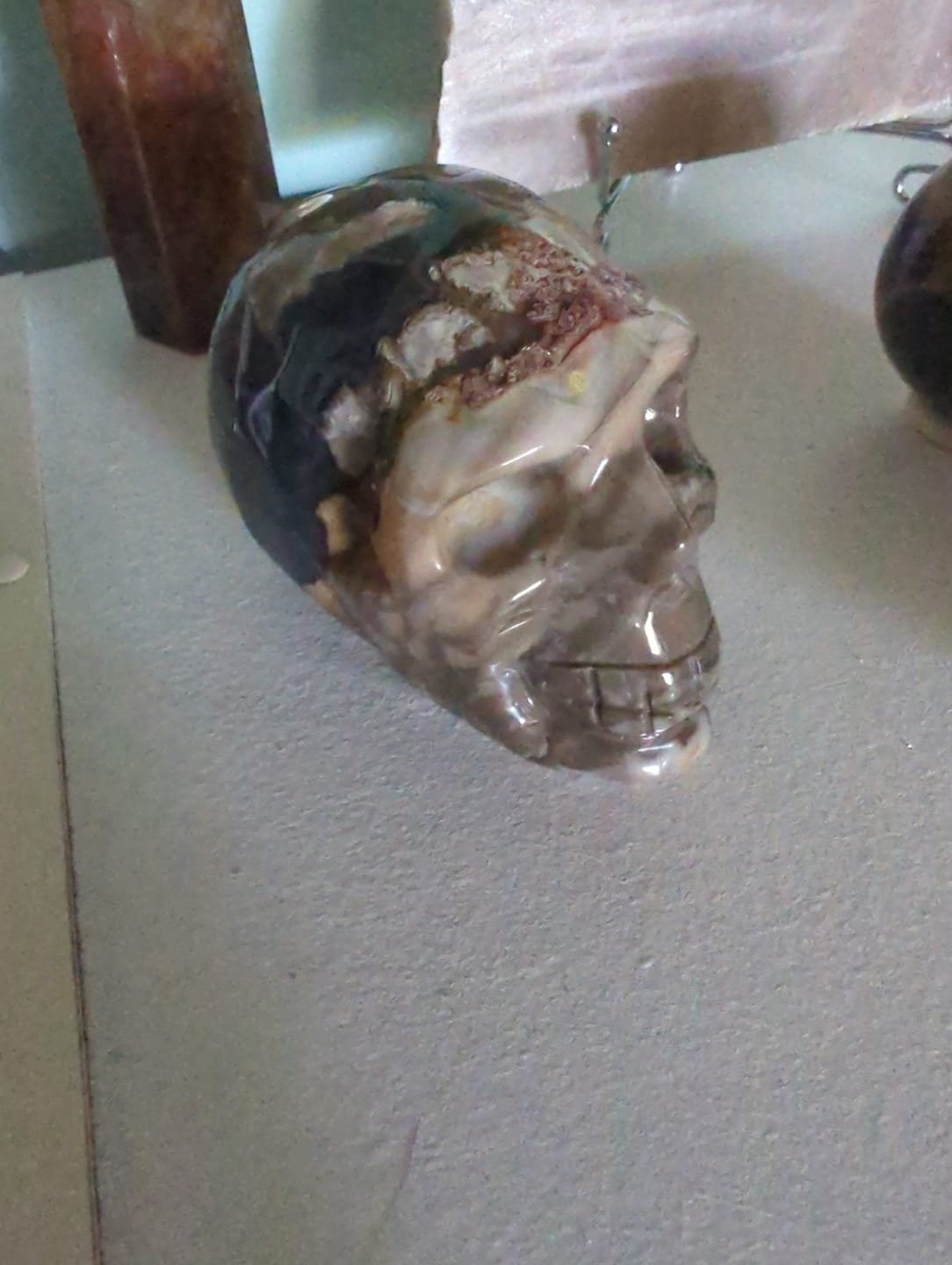 Customer photo review of Unique,A Slightly Imperfect Natural Crystal Volcanic Agate Skull Carving