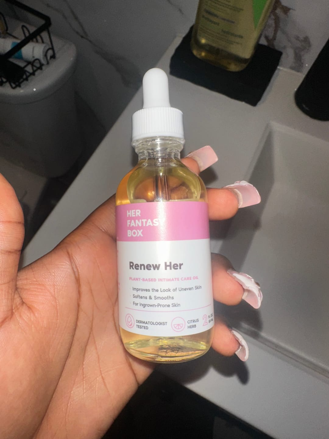 Customer photo review of Her Fantasy Box Renew Her Yoni Oil - For Dryness, Ingrown Hair, Dark Marks & Scars