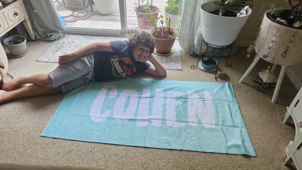 Customer photo review of Personalized Beach Towel: Bold Font Custom Name, Vacation Gift