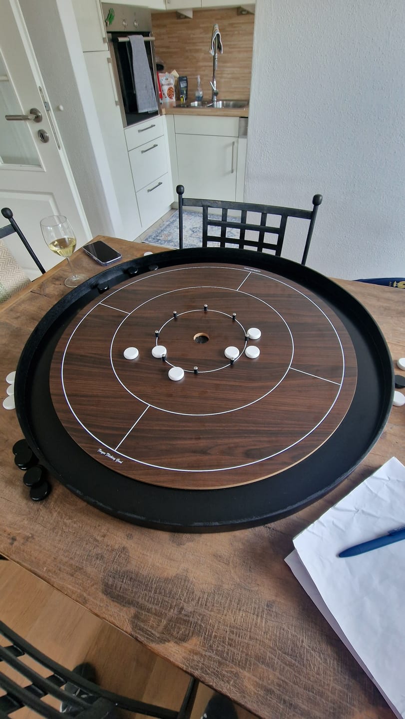 Customer photo review of Crokinole Set Tournament Size Board Game with Wooden and Black Discs and Powder | Wood